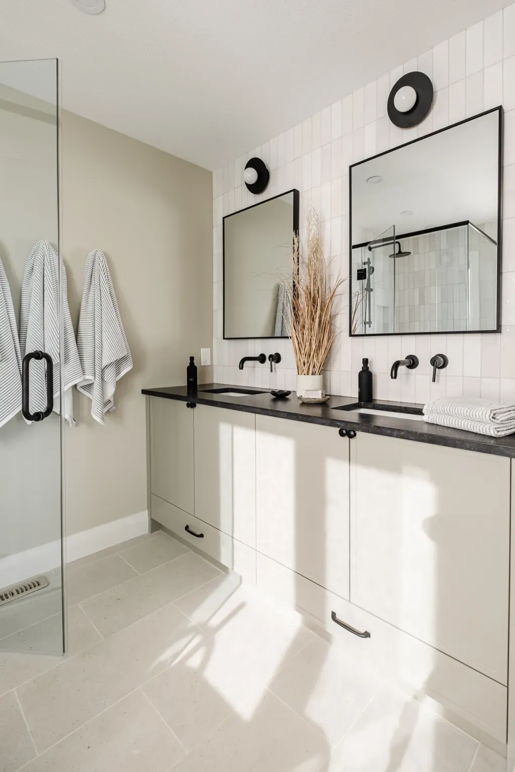 Bathroom with light tile flooring