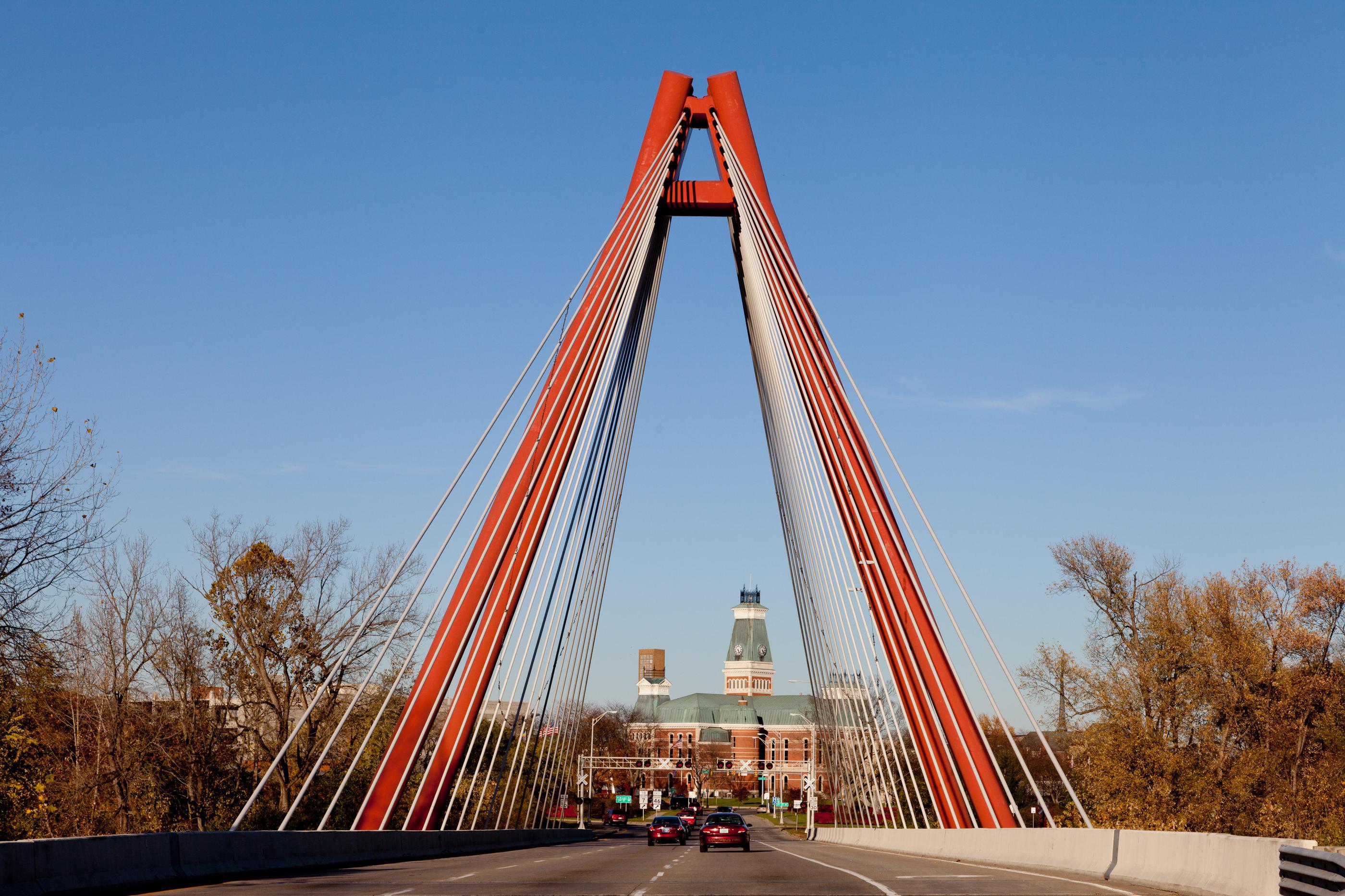 child on wood floor in kitchen
