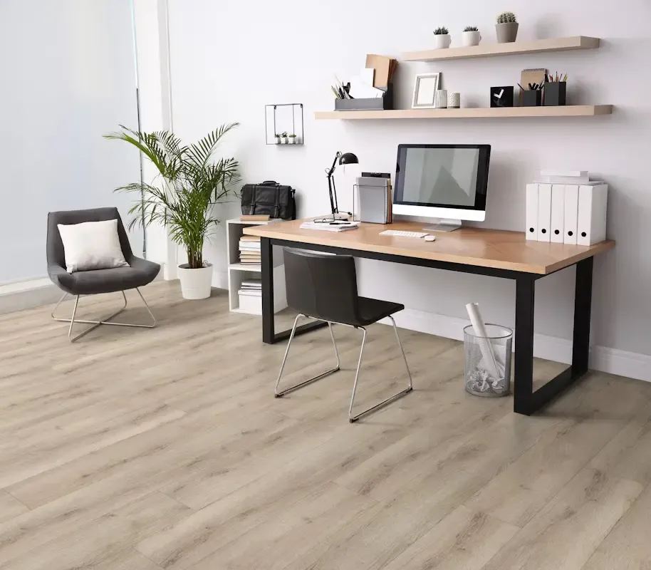 Desk in a home office with wood floors